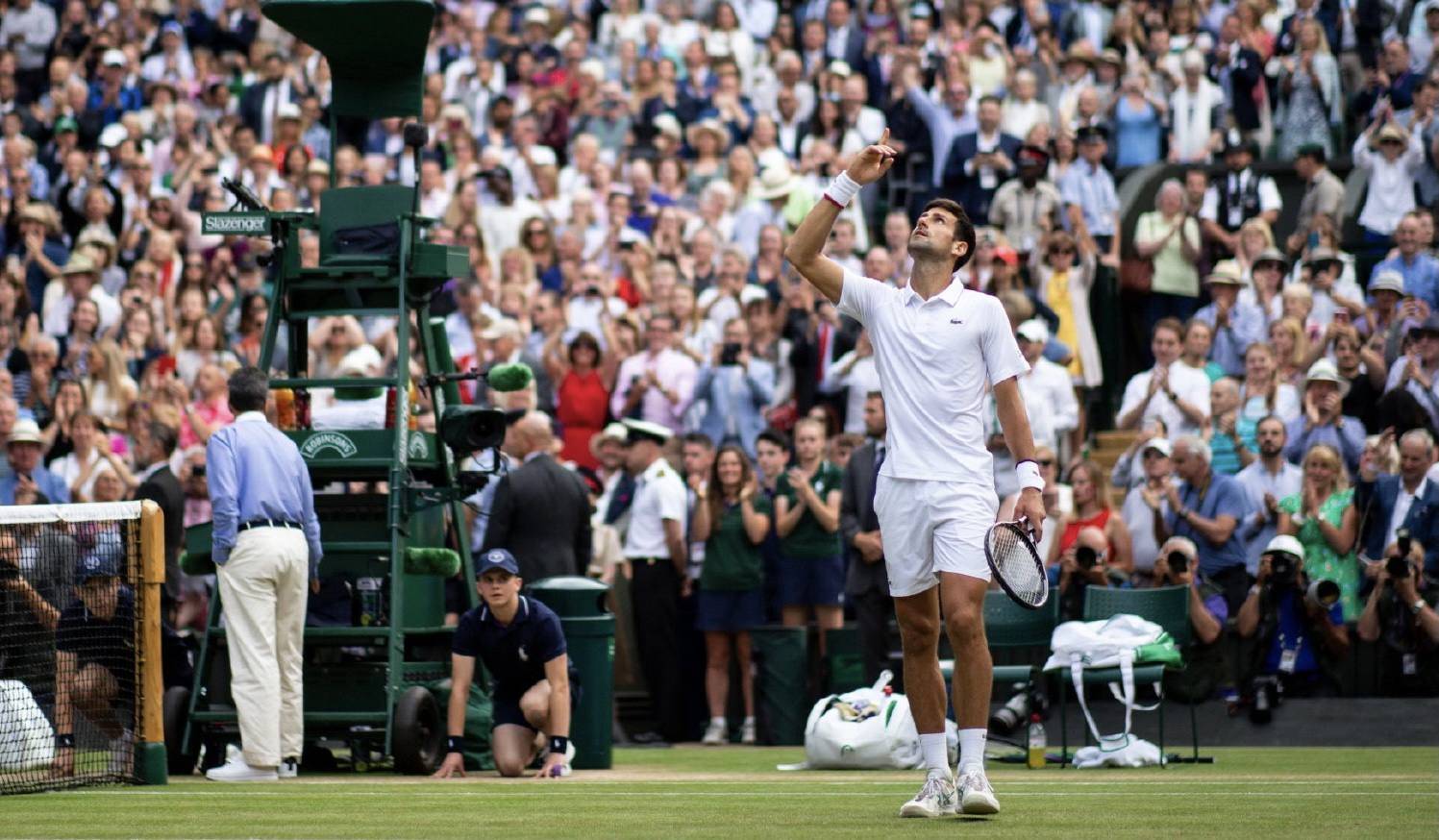 包含美网鏖战温网，鲁德刷新纪录的词条